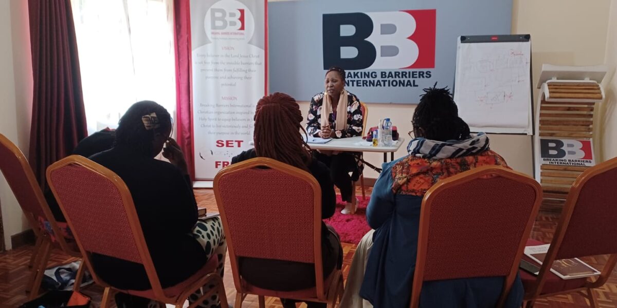 Pastor Nellie leads a group deliverance session at BBI office in Nairobi,Kenya